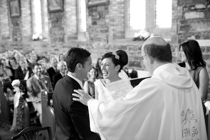 bride laughing wedding ceremony vows